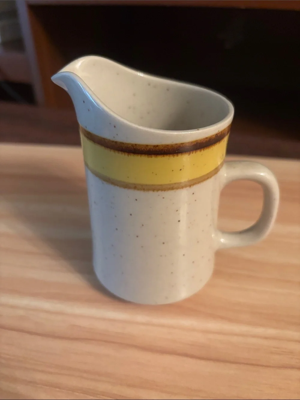 Rainbow Ceramic Creamer with Yellow Band and Brown Rim